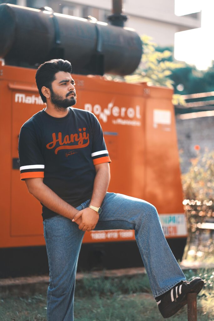 Man in casual outfit posing outdoors in Chandigarh, India.